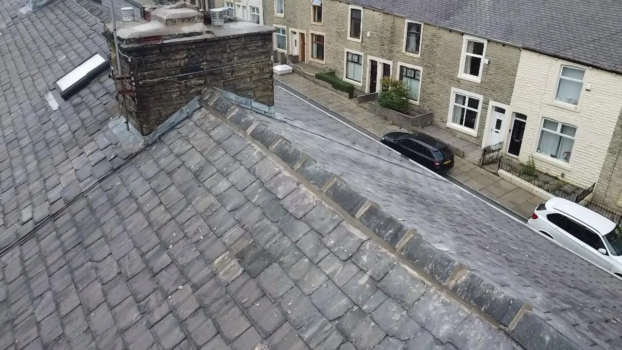 Slate roof covering